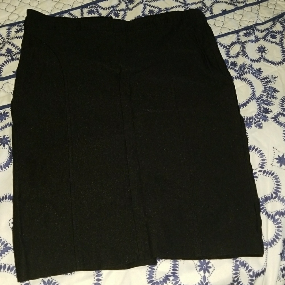 Pencil skirt with back slit.