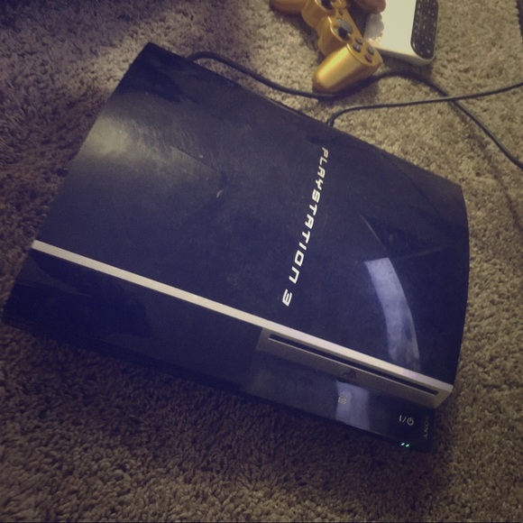 Play Station 3 w/ TWO controllers & 4 Games - Picture 1 of 5