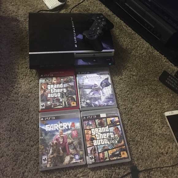 Play Station 3 w/ TWO controllers & 4 Games - Picture 4 of 5