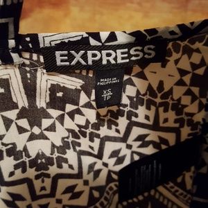 Express Tops - Open back top. Express Tops - Open back top.