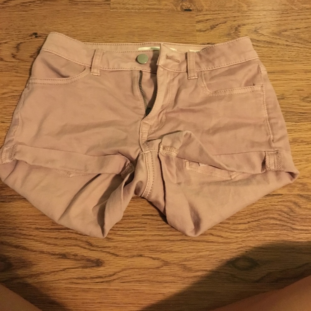 Rose gold shorts.