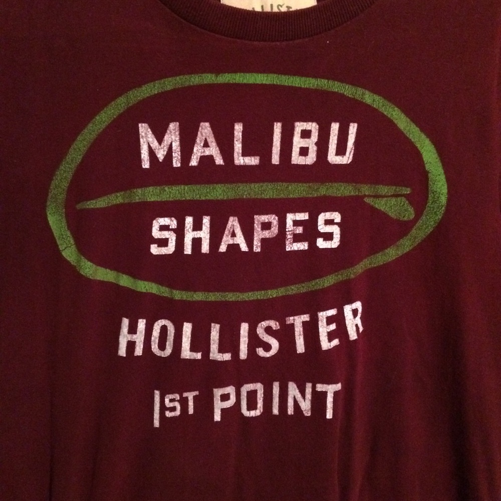 Hollister shirt. (With a few holes on the bottom)
