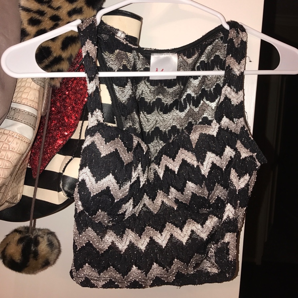 A black and silver crop top