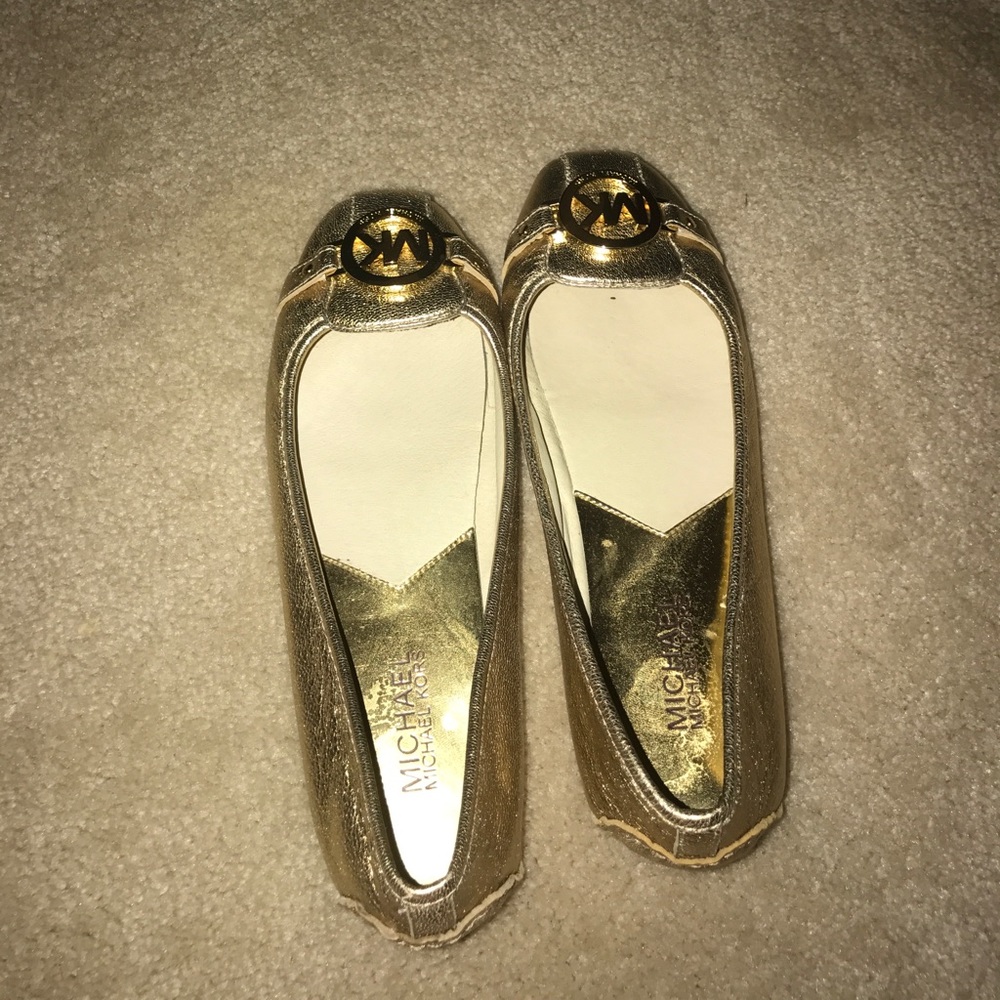 Michael Kors gold flats
