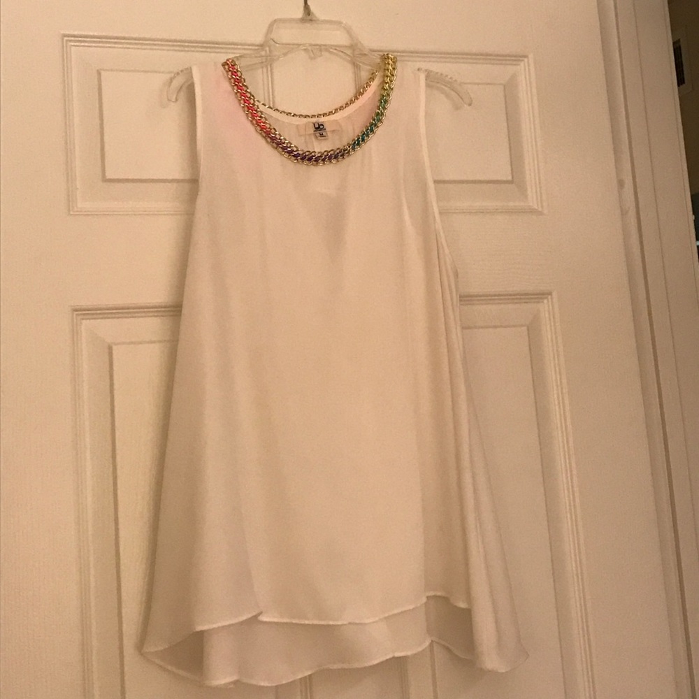 White blouse with gold and multi-colored collar