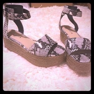 Via Spigia- Nemy snake embossed platform sandal.