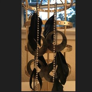 Long Bebe feather statement earrings