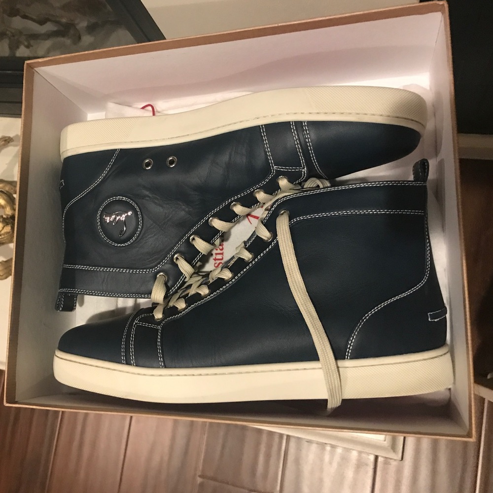 Authentic Christian Louboutin flat calf blue.