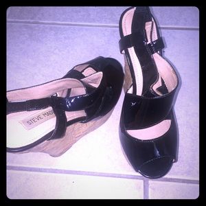 Black shoes with toes out