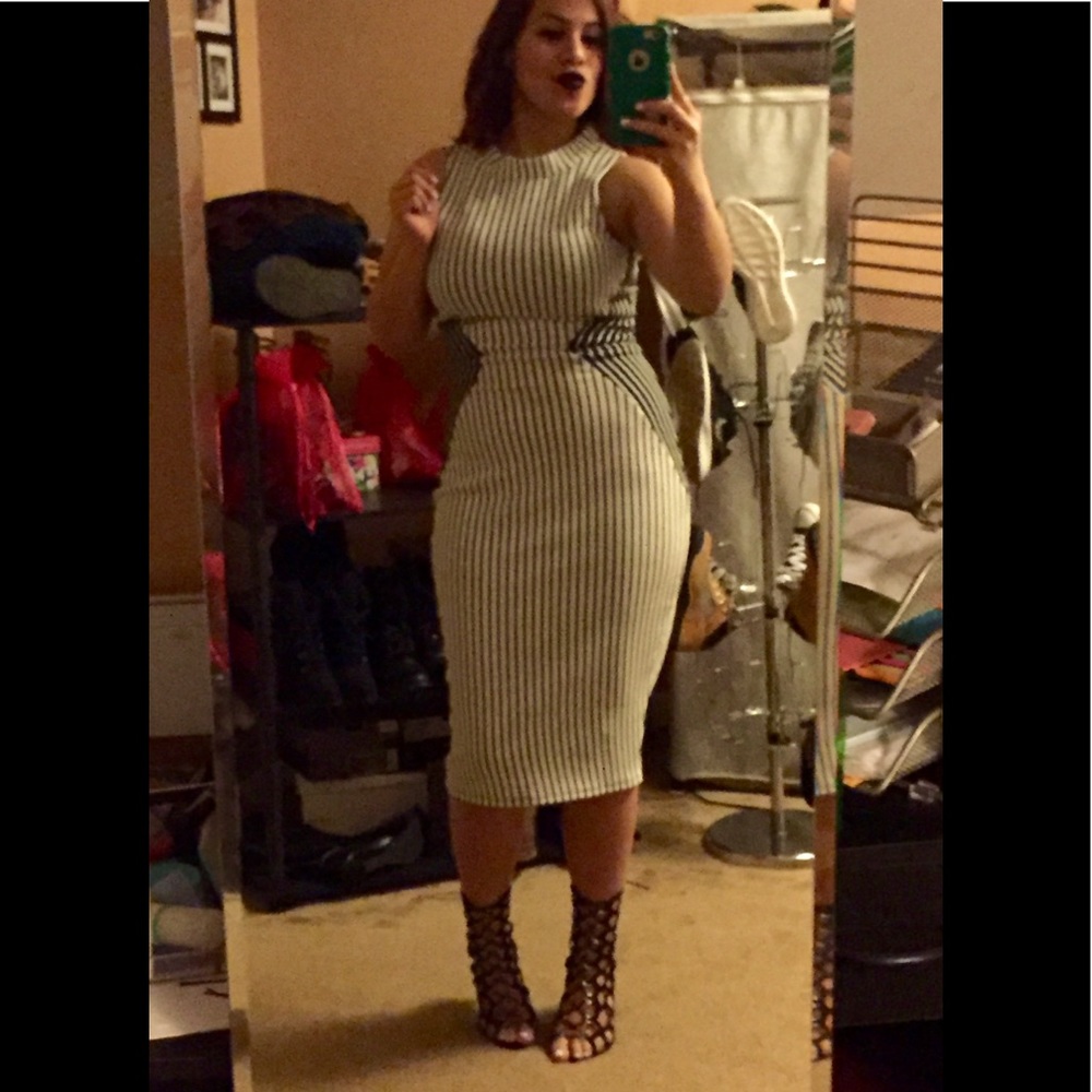 Striped dress.Size medium but stretches ILLUSION