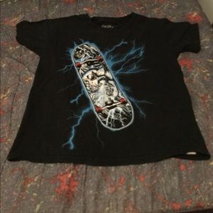Skateboarder shirt with lightning bolts