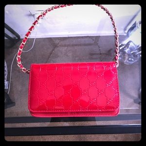 Authentic red Bebe purse