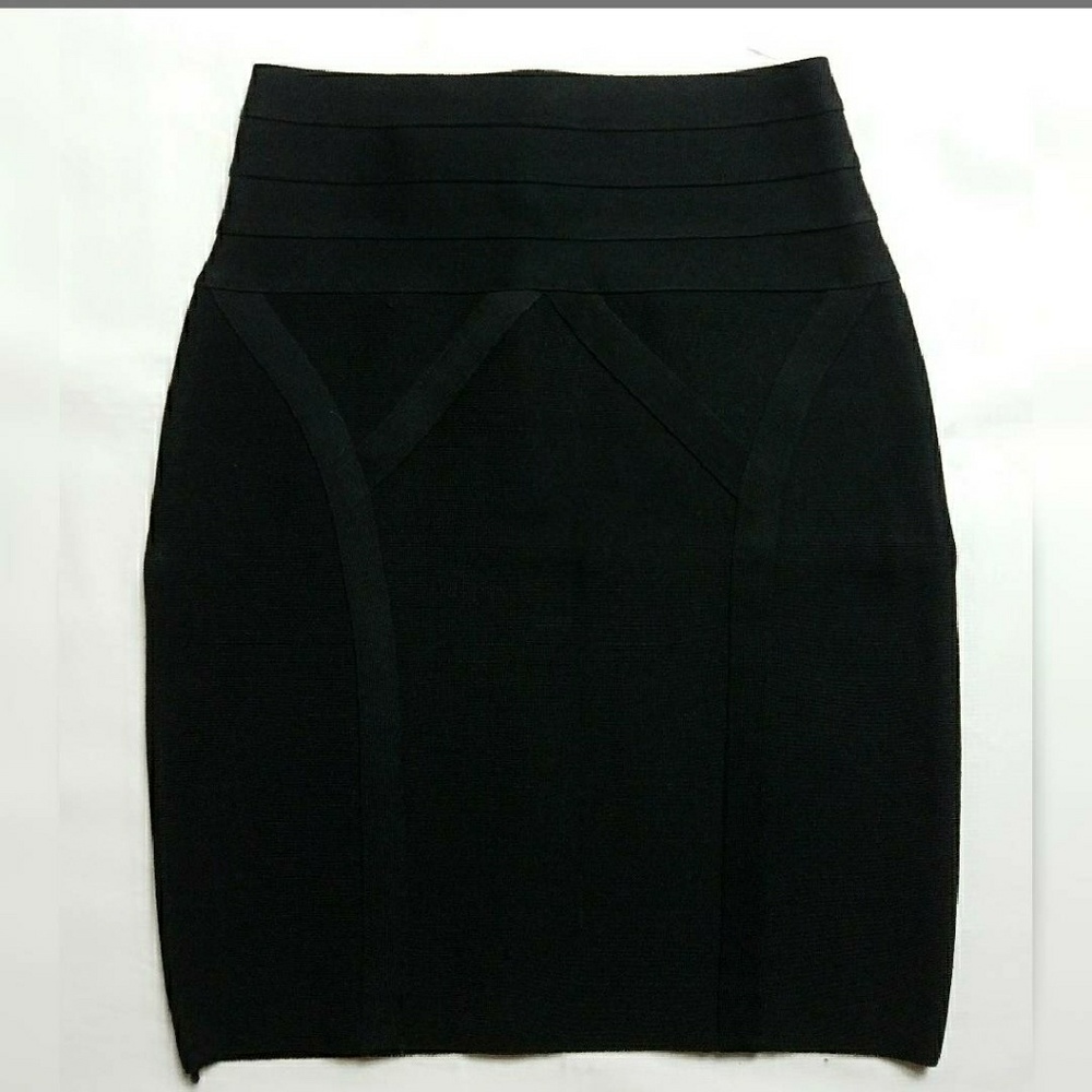 BEBE SKIRT .... STRETCH CLASSY BLACK SKIRT size xs