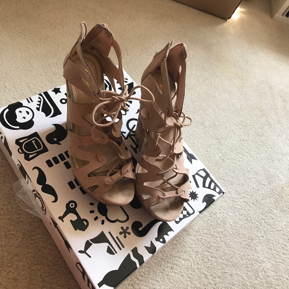 Laced up heeled sandals
