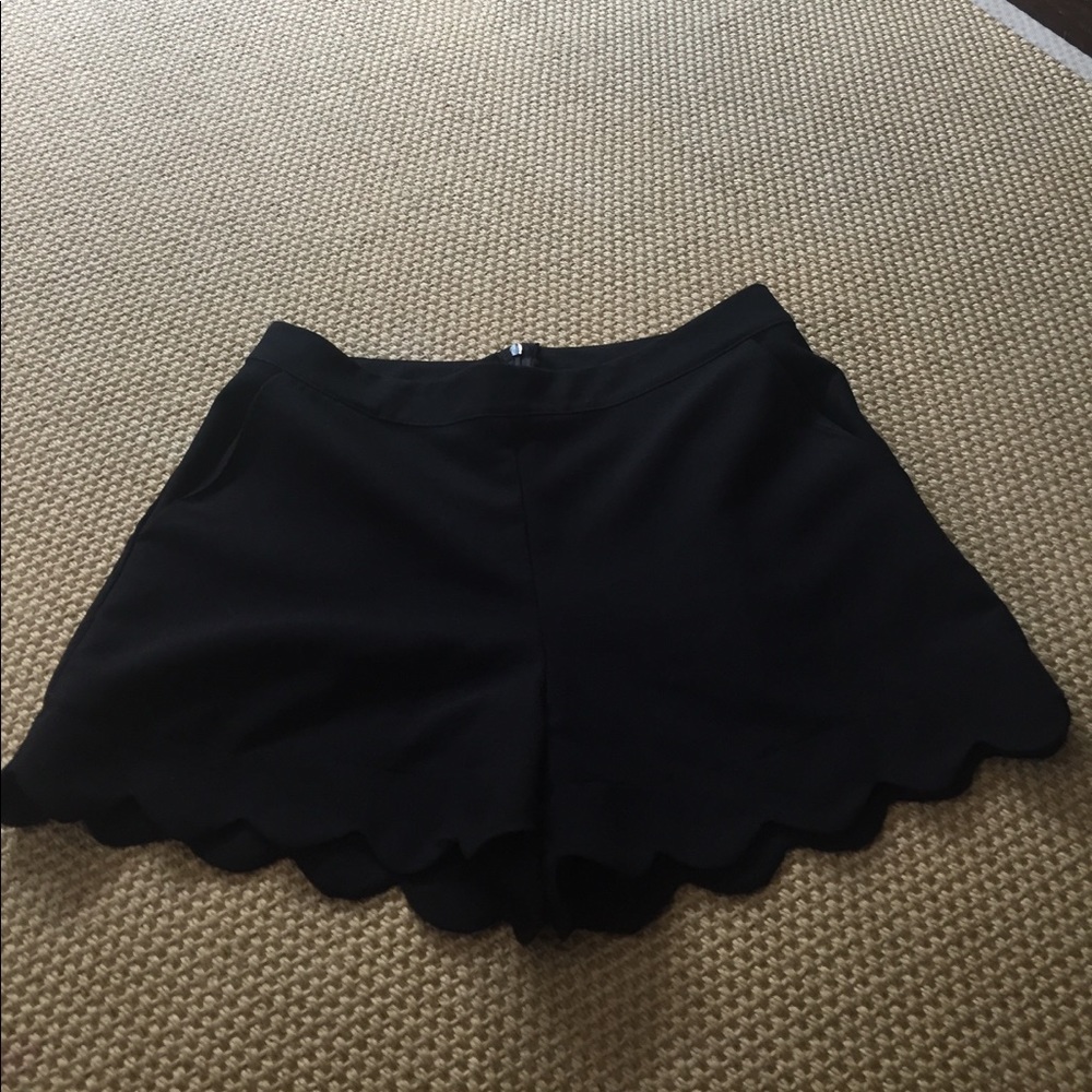Black scalloped shorts