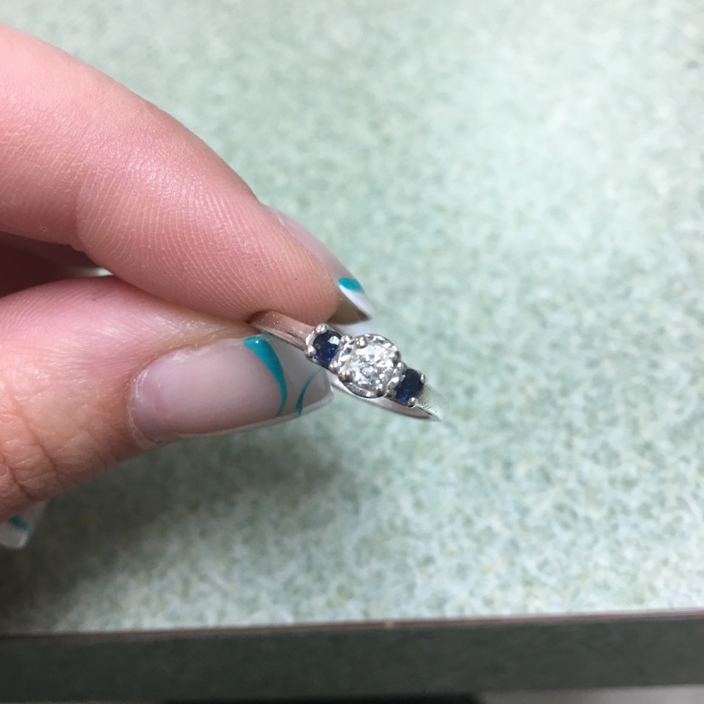 Diamond ring with sapphires