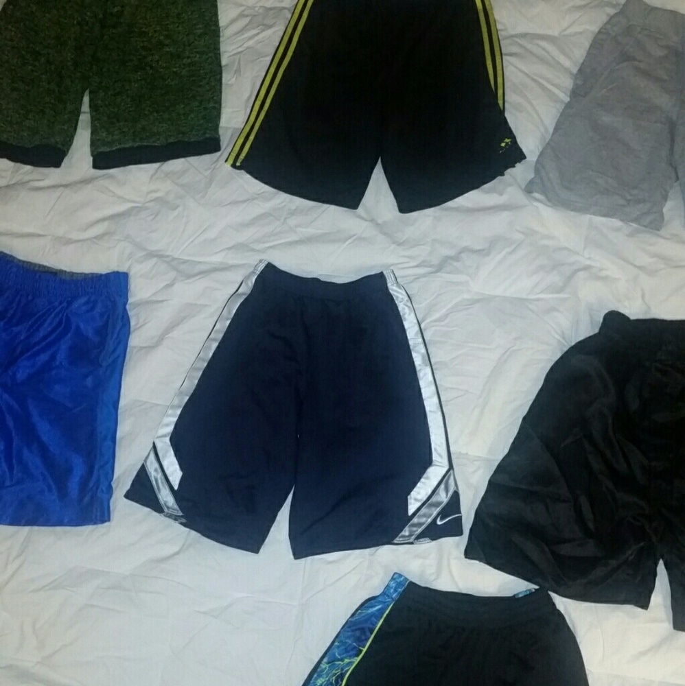 7 pairs of shorts Reebok Starter and Dri fit