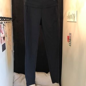 Lucy classic black leggings, size small.