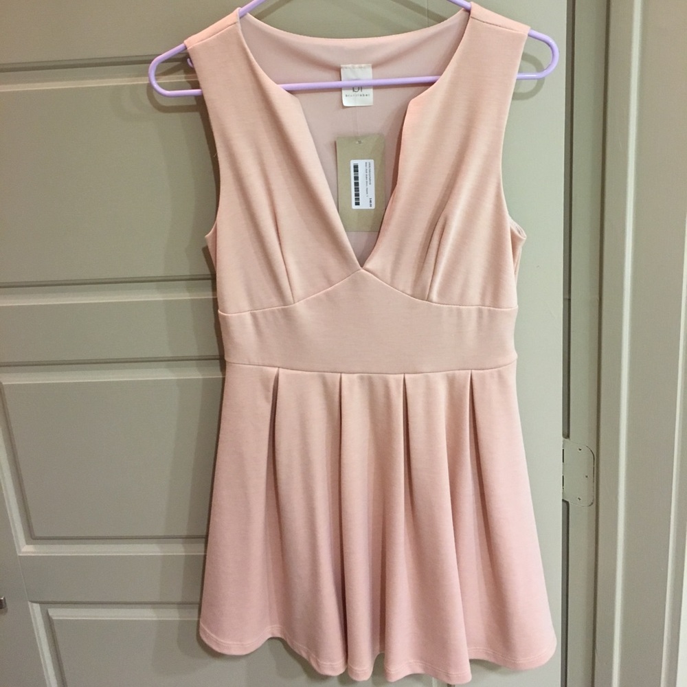 Light pink deep v mini dress