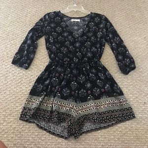 Blue and floral mid sleeve patterned romper