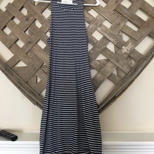 A navy striped open back sun dress.