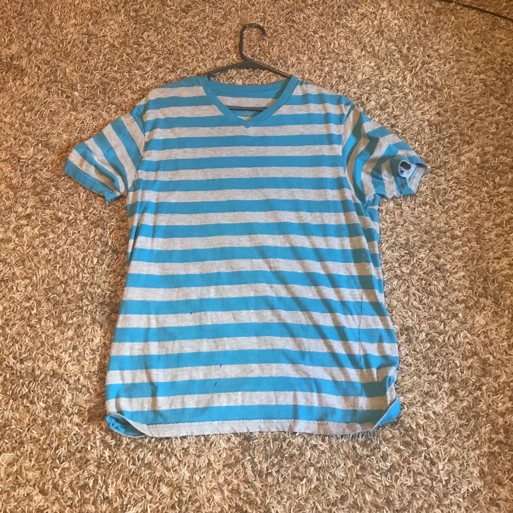 Blue and Gray striped shirt.