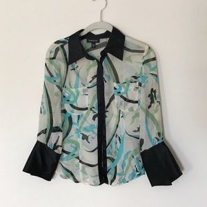 Sheer Bebe blouse.