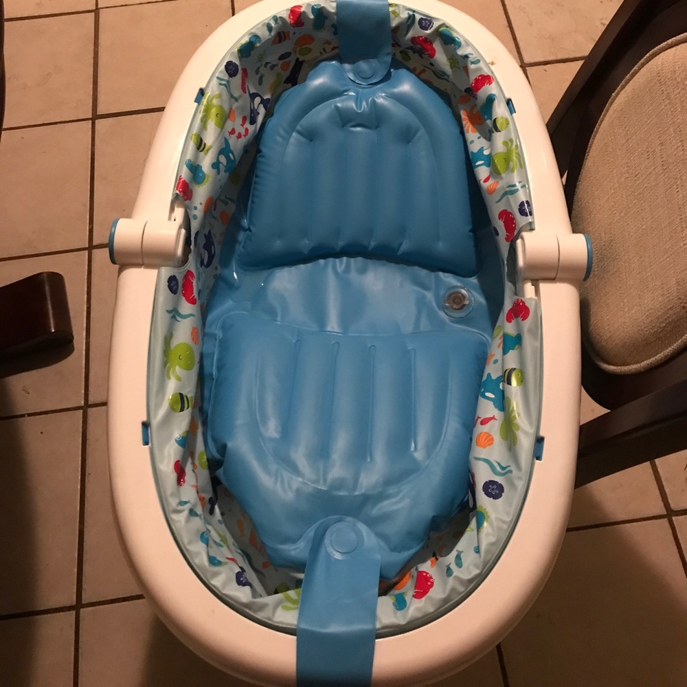 A blow up bath tub for infants