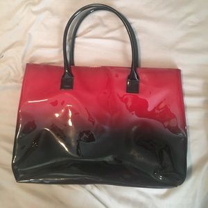 Red and black Elizabeth Arden tote bag