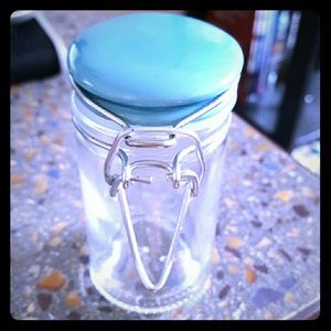 Little Blue-topped Glass Container