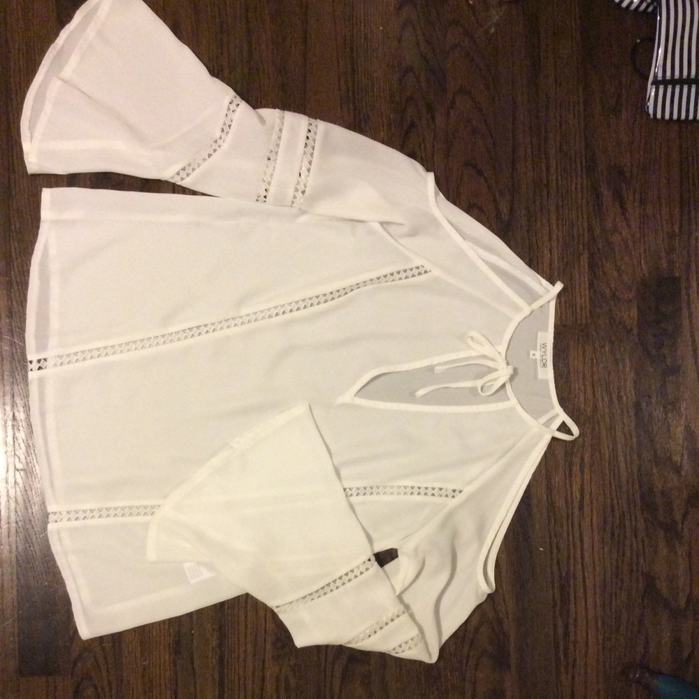 Sheer top with cold shoulder and bell sleeves