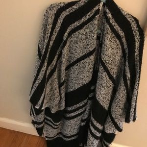 Gray and black poncho