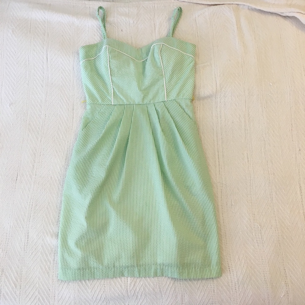 A. Byers green and white fitted dress
