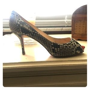 Christian Louboutin python pumps