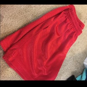 Red women's basketball net shorts