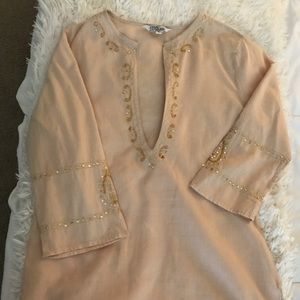 Tunic or cover up for swimwear.