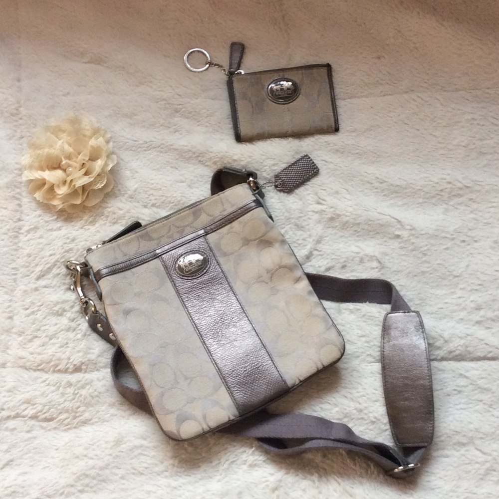 Silver cross body coach bag and wallet.
