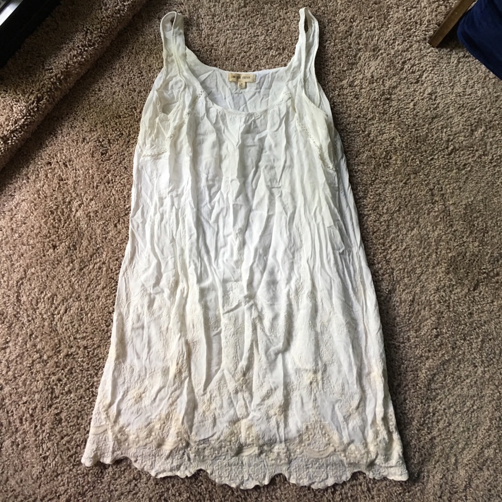 White dress with beige lace detail