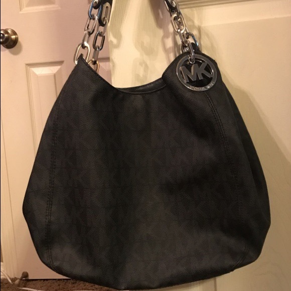 Michael Michael Kors Leather-Trimmed Monogrammed Shoulder  Black monogrammed Michael Kors leather hobo bag