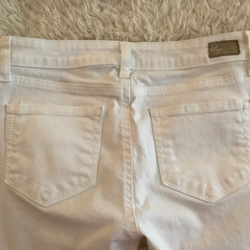 White skinny long Paige jeans.