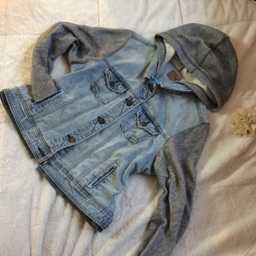 Jean jacket with sweater hood and arms.