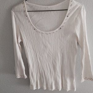 white long sleeve shirt , w/ beads on cuffs/collar