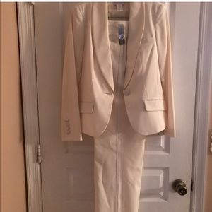 Ivory color new pant suit Size 4