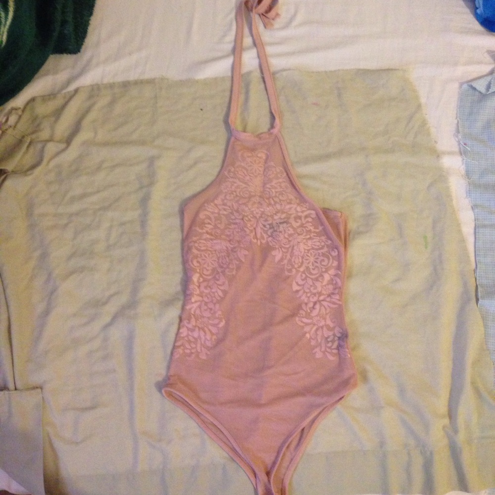 Pink transparent body suit