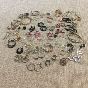 Earrings. Over 50 pair with cute zippered bag.