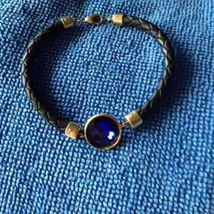 Leather bracelet with blue glass gem