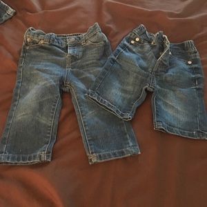 Boys 6/9 months 7FAM jeans and Jean shorts.