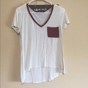 White T with red pocket