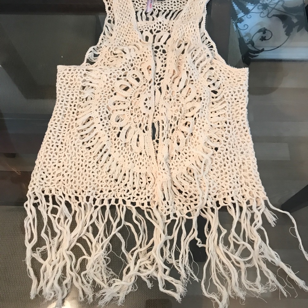 Three crochet vests $6