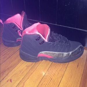Pink and black Jordan Retro 12